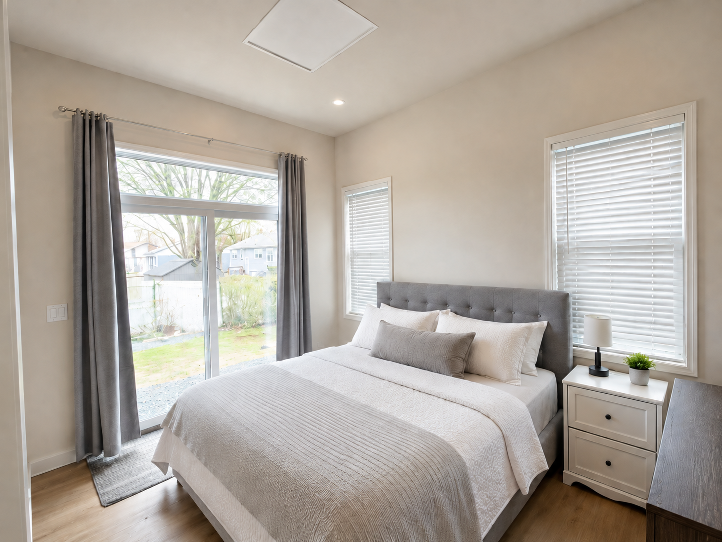 Finished bedroom inside a backyard suite