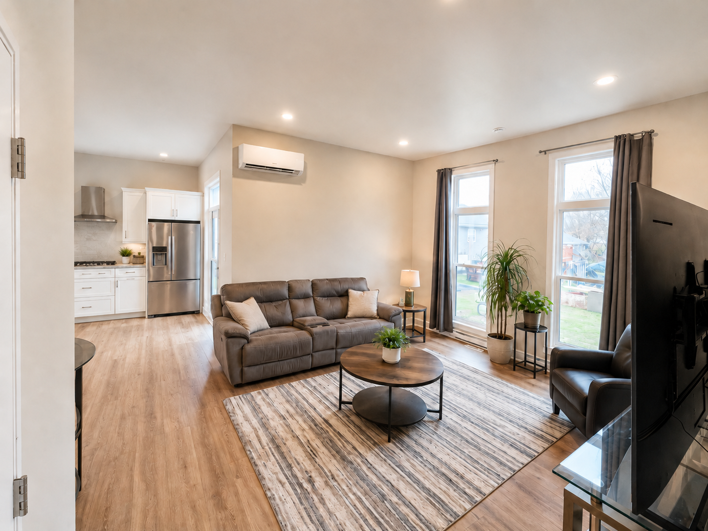 Finished living room inside a backyard suite